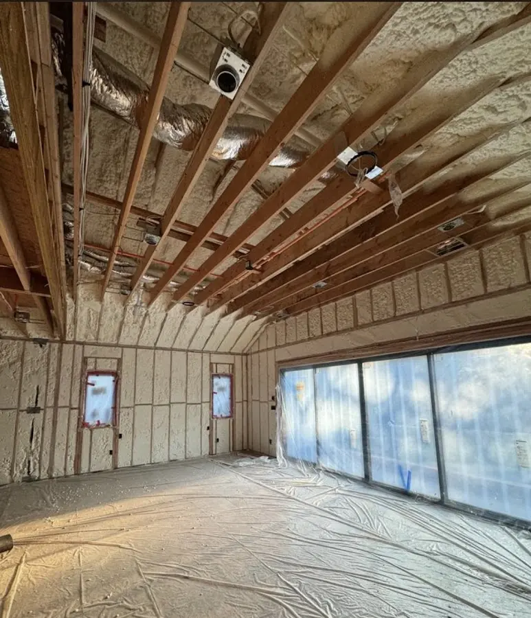 Interior walls and ceiling insulated with spray foam during new construction in Maywood